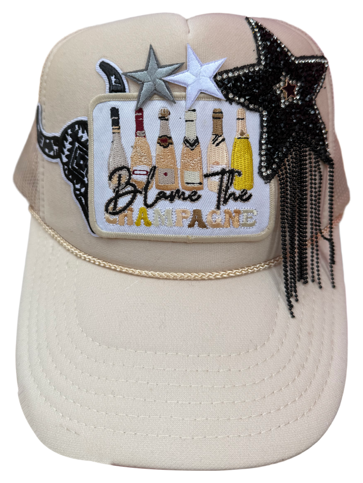 Cream Blame the Champagne hat with stars and black beaded fringe